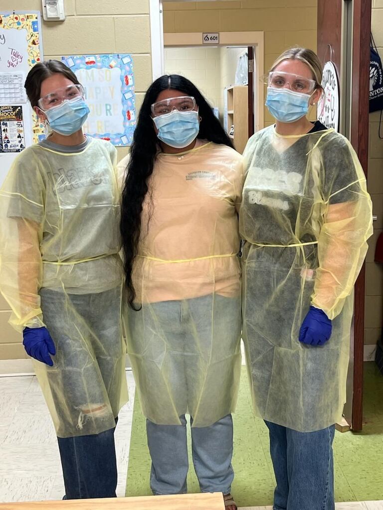 Donning and Doffing their PPE! 