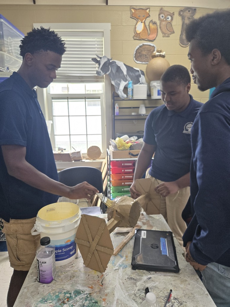 Art students creating 3-D objects