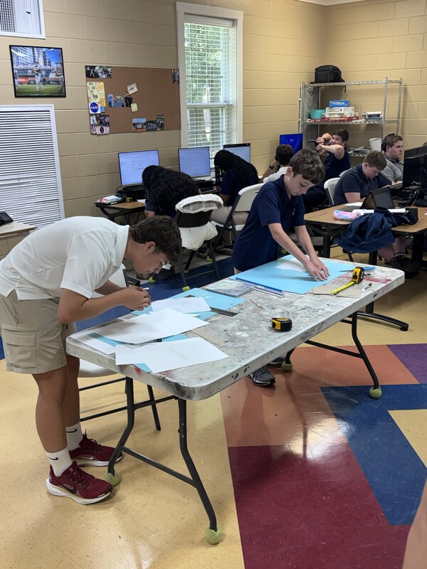 Students constructing model