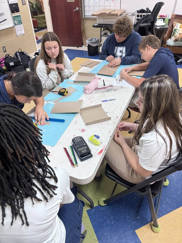 Students constructing model