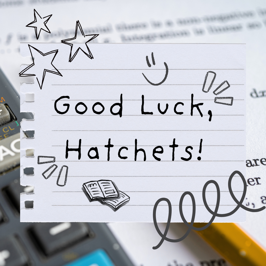 Calculator and pencil with the words, "Good Luck, Hatchets!"