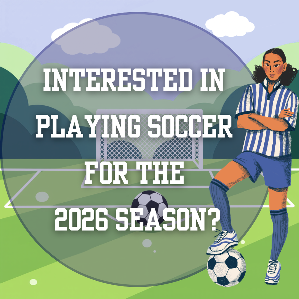 Girl on a soccer field holding a soccer ball under her foot. 