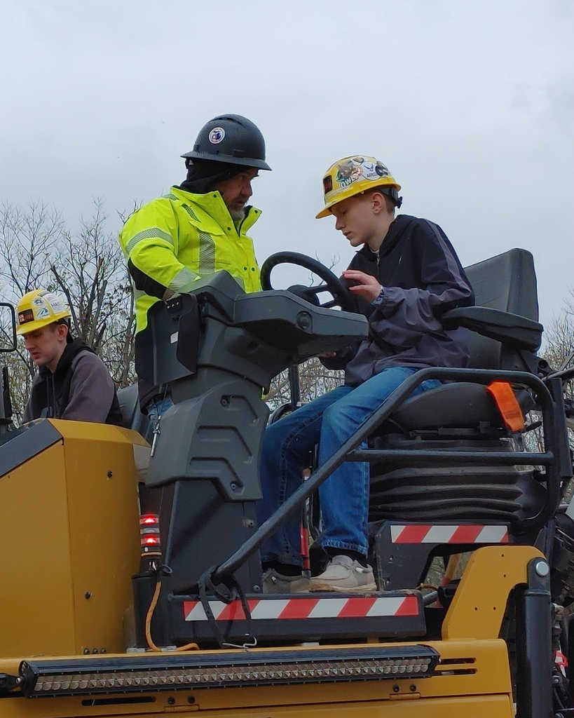 High School Students enjoy exploring heavy machinery at this year's Construction Day. 