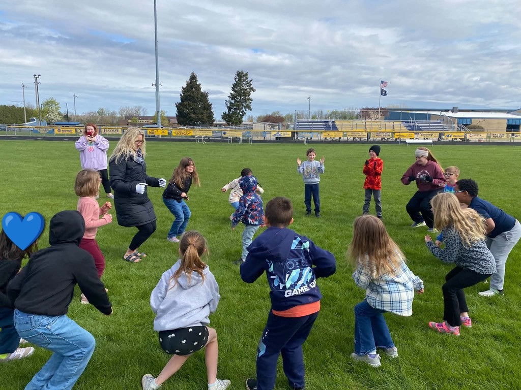 Staff, Students, & their families meet at Claude March Field to celebrate ACES today. 