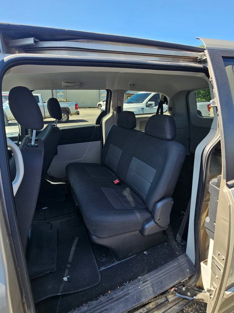 Middle row-2 seat belts, back row has 3