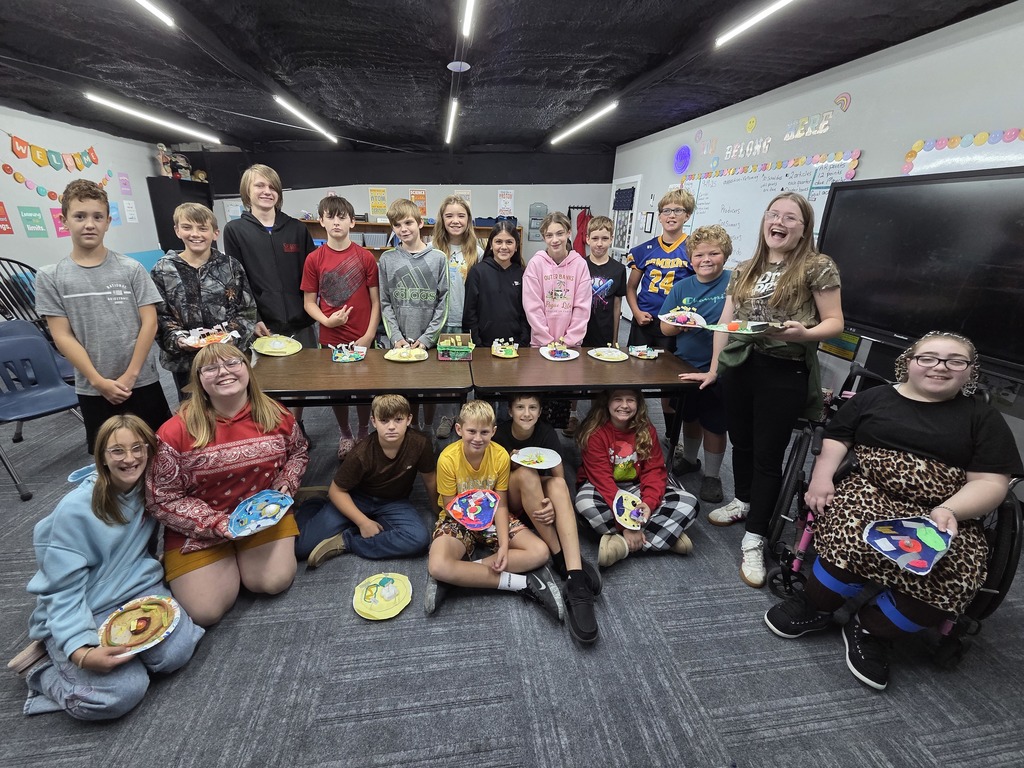 6th grade Science students with models of cells