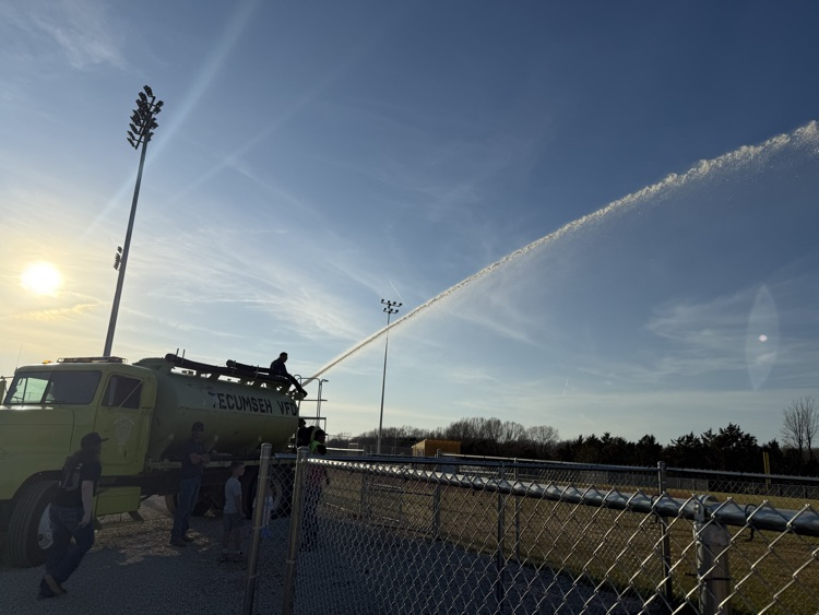 Water on the softball field! 