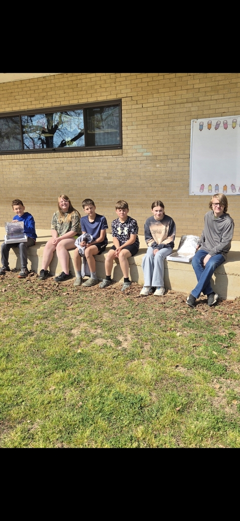 6th grade Science students making solar ovens