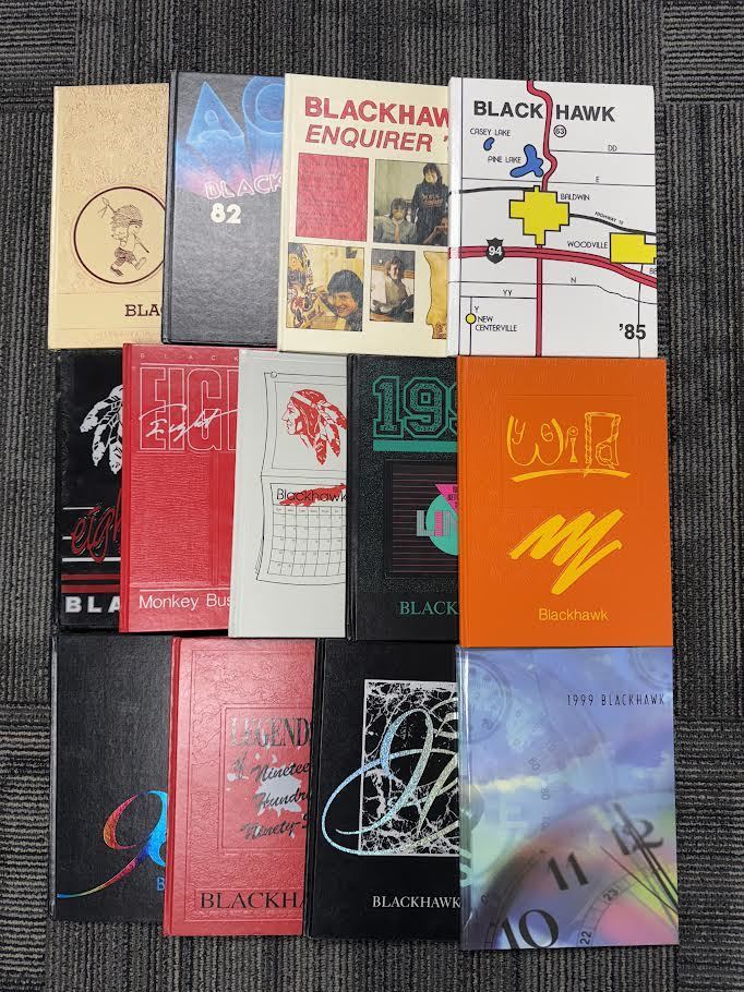 Image of 13 old yearbooks