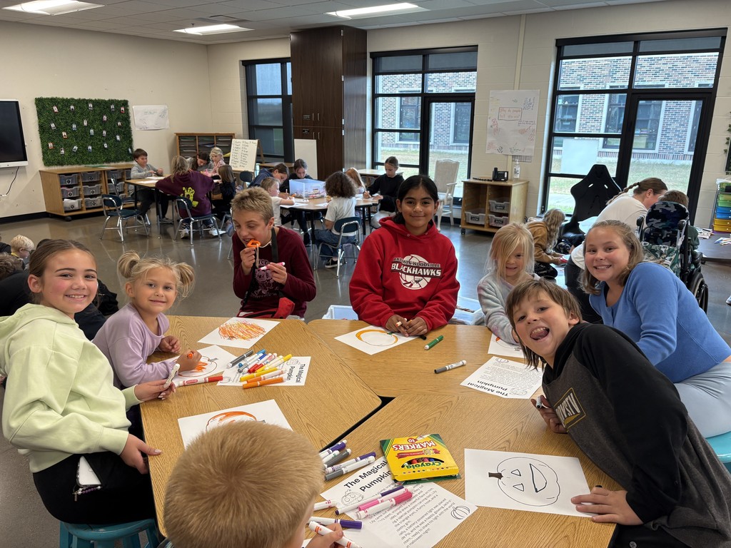 Smiling students with the partners coloring