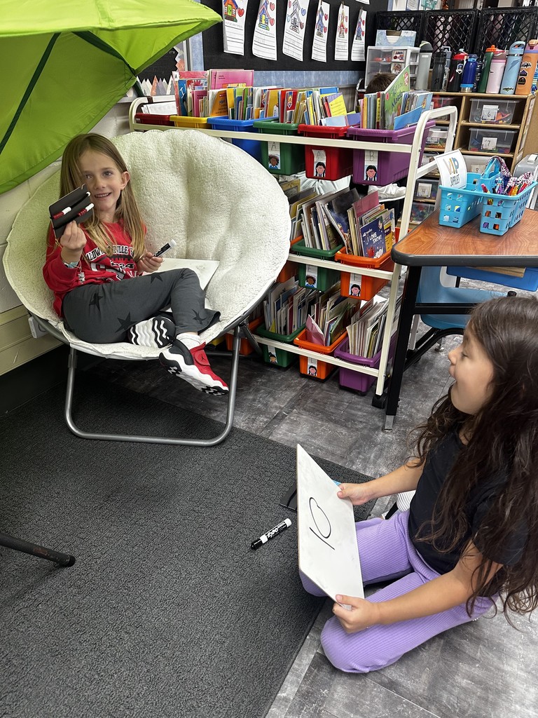 Two girls working on math.