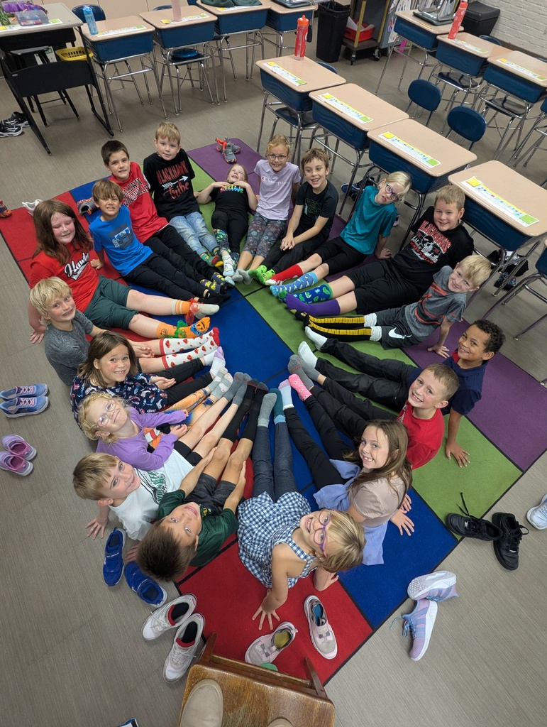 Students in a circle with their crazy socks.