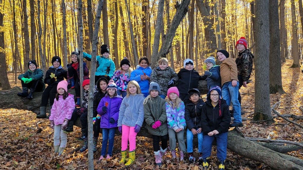 Students in a beautiful fall photo.