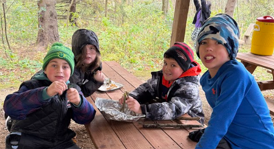Students working at the school forest.