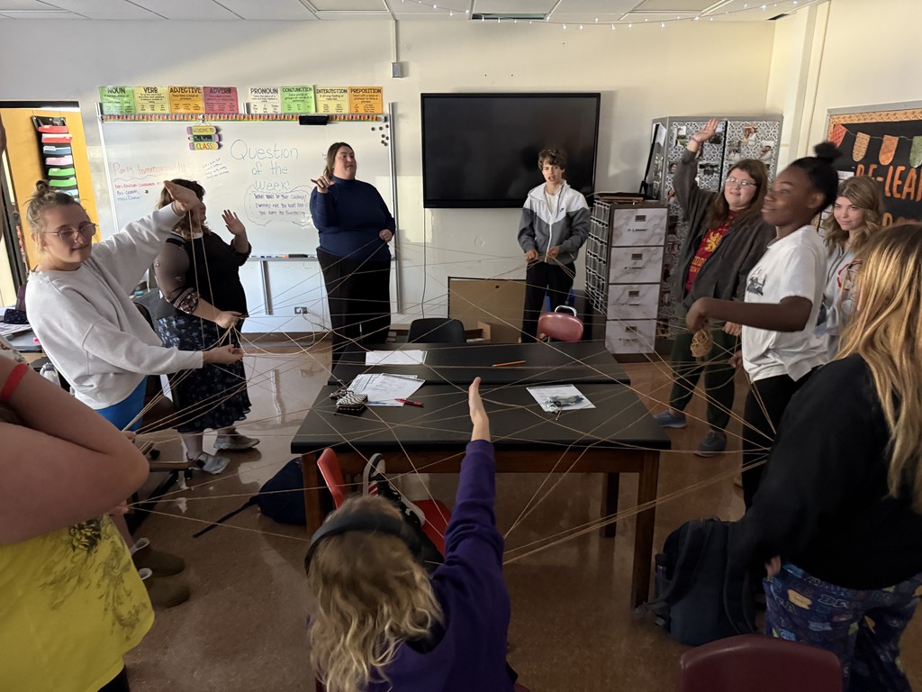 Students working with a web.