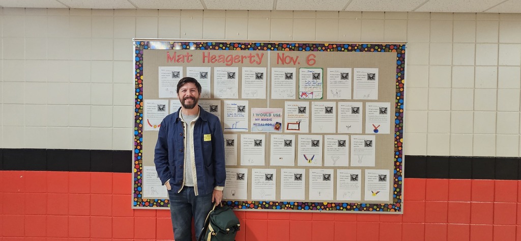 Author with a bulletin board.