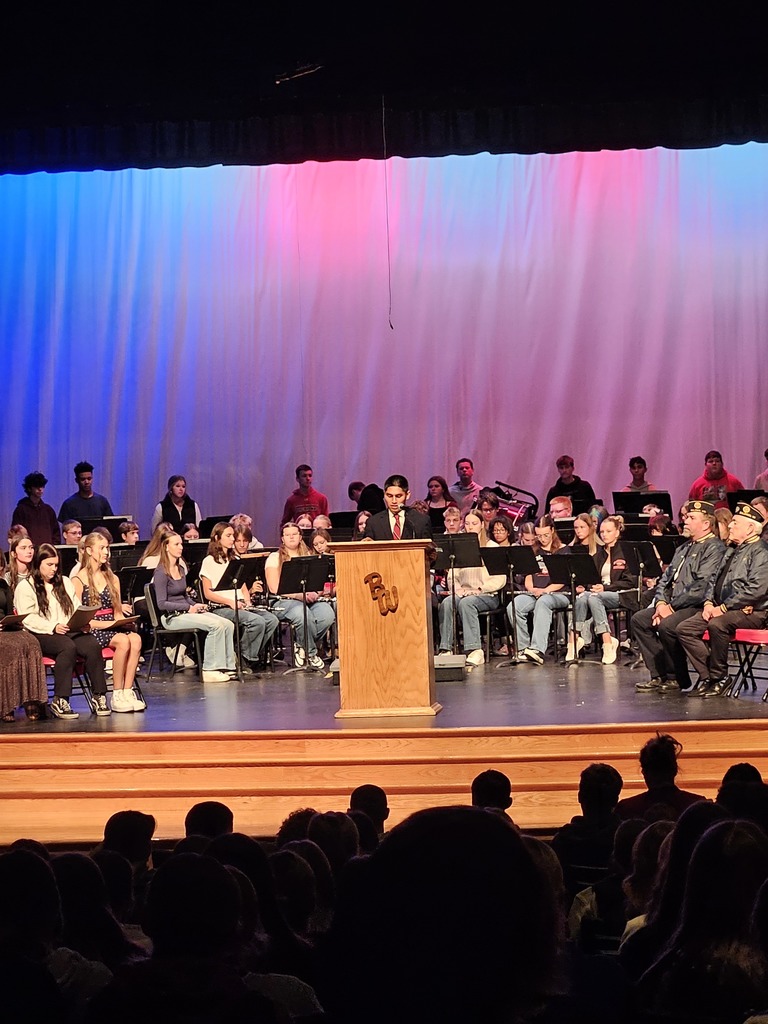 A student speaking to the crowd.