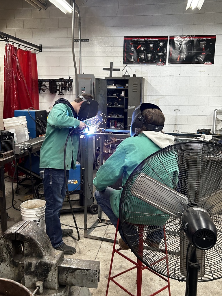 Two students in the tech ed room.