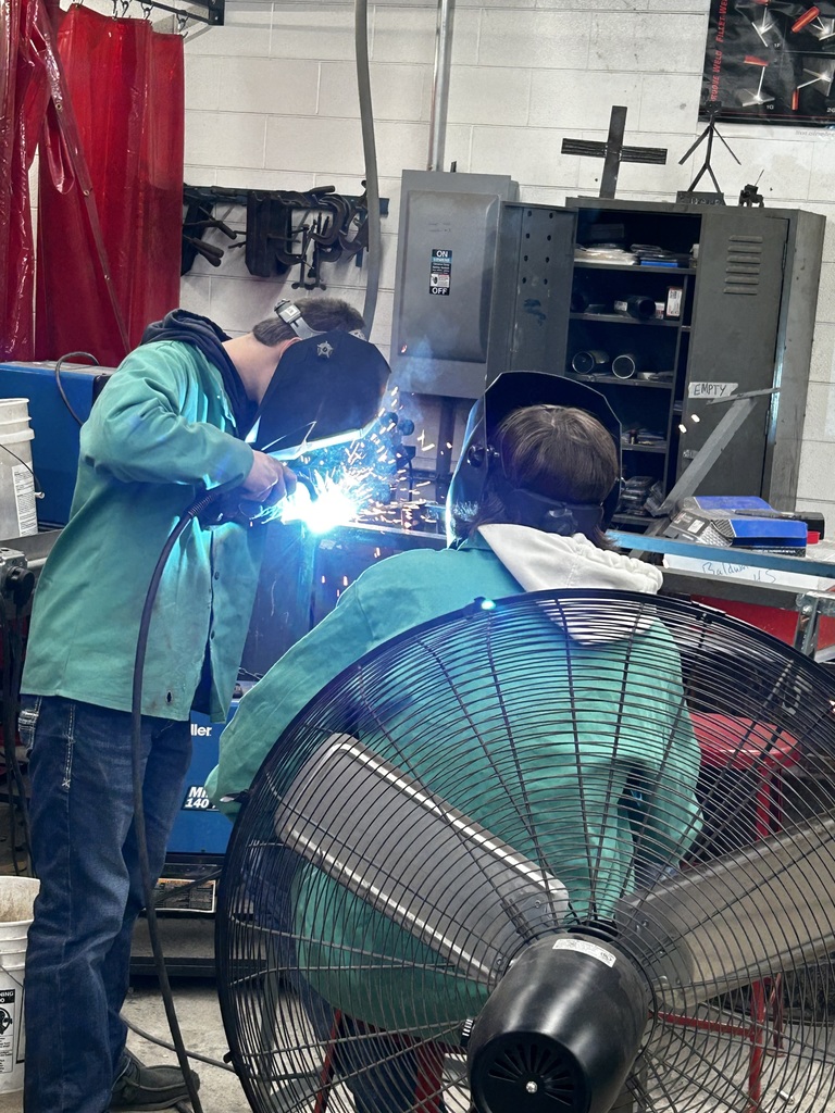 Two students working on a project.