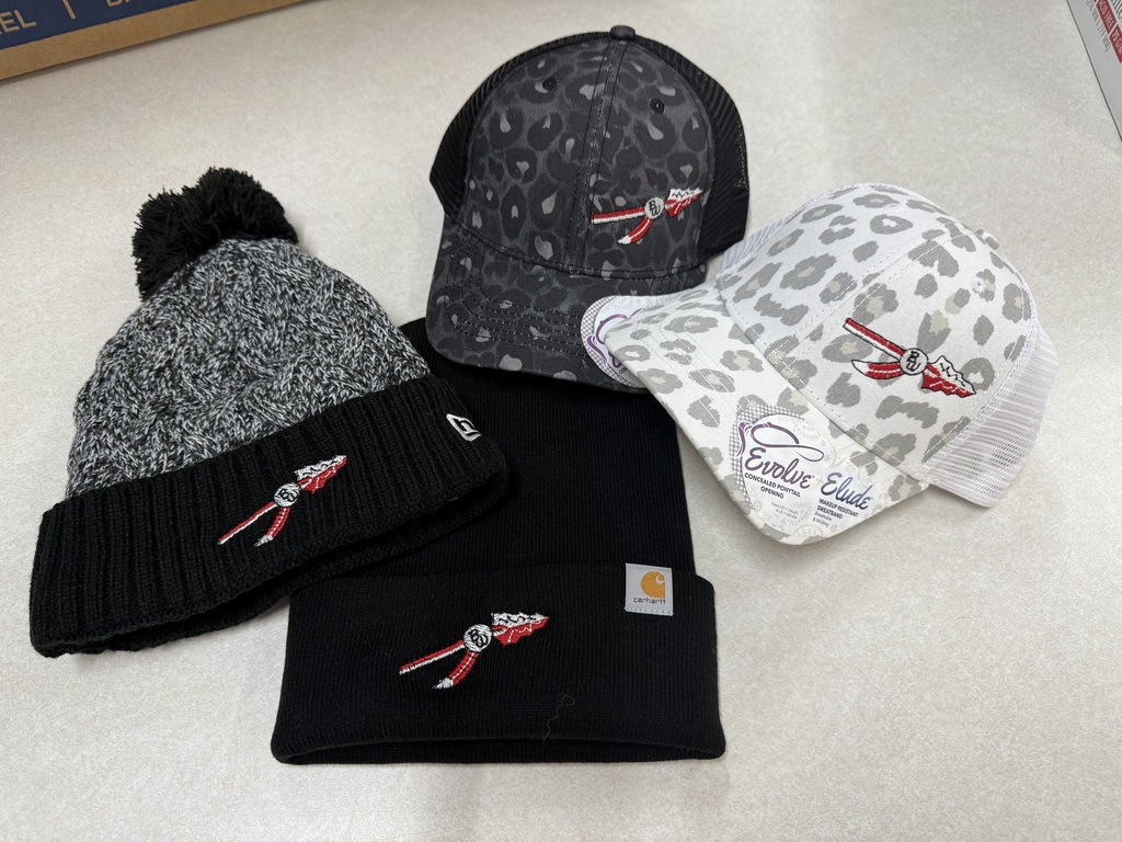 Four different hats for sale.