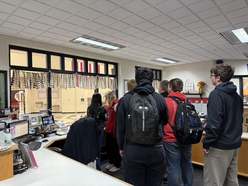 Students reciting the Pledge of Allegiance.