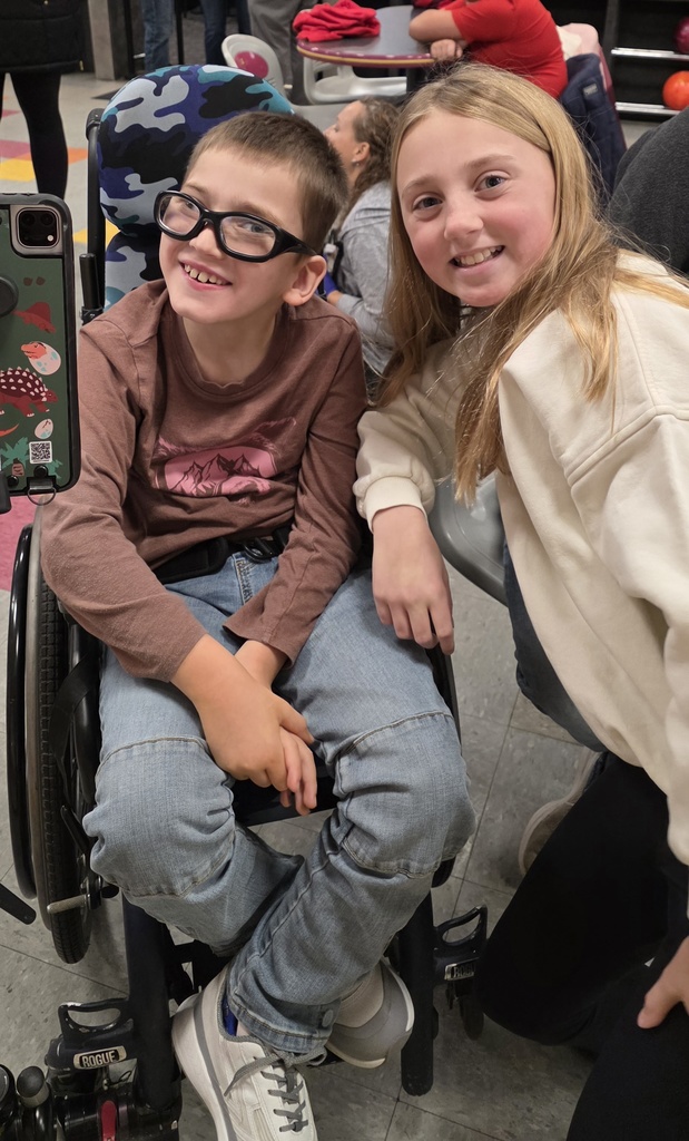 Smiling students at the bowling alley.
