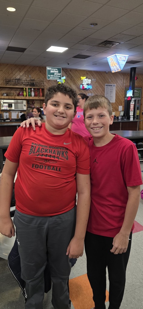 Two students at the bowling alley.