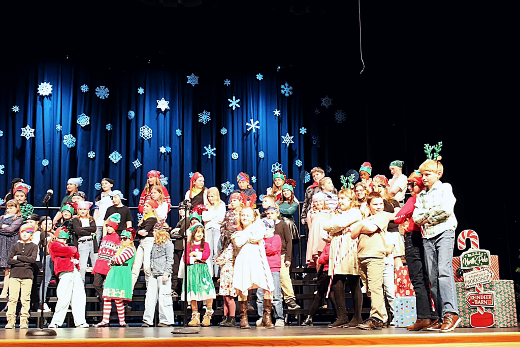 Picture of the stage with students.