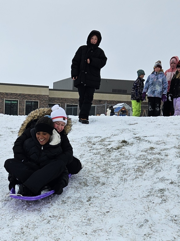 More students on a sled.