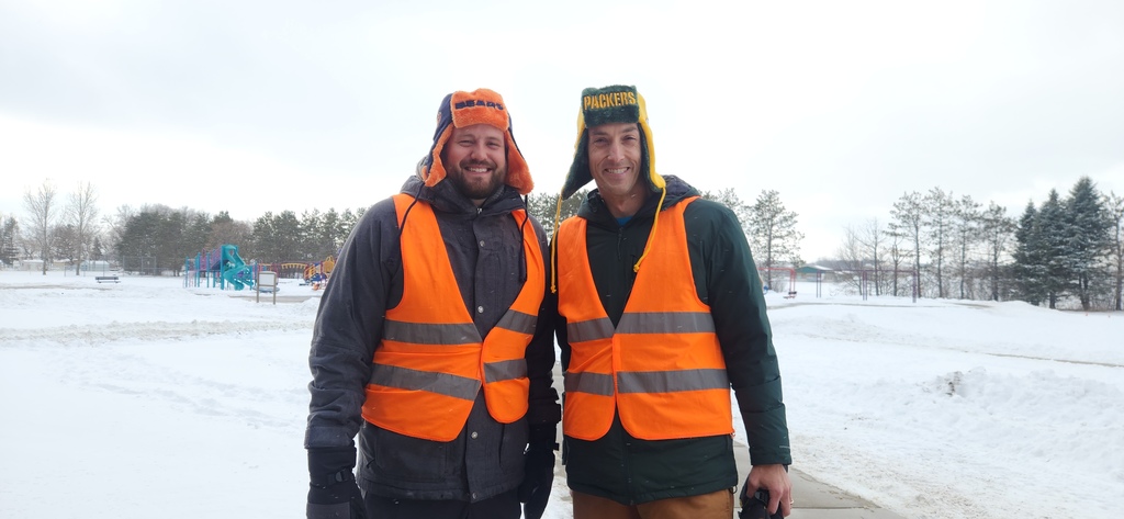 Principals outside in their winter gear.