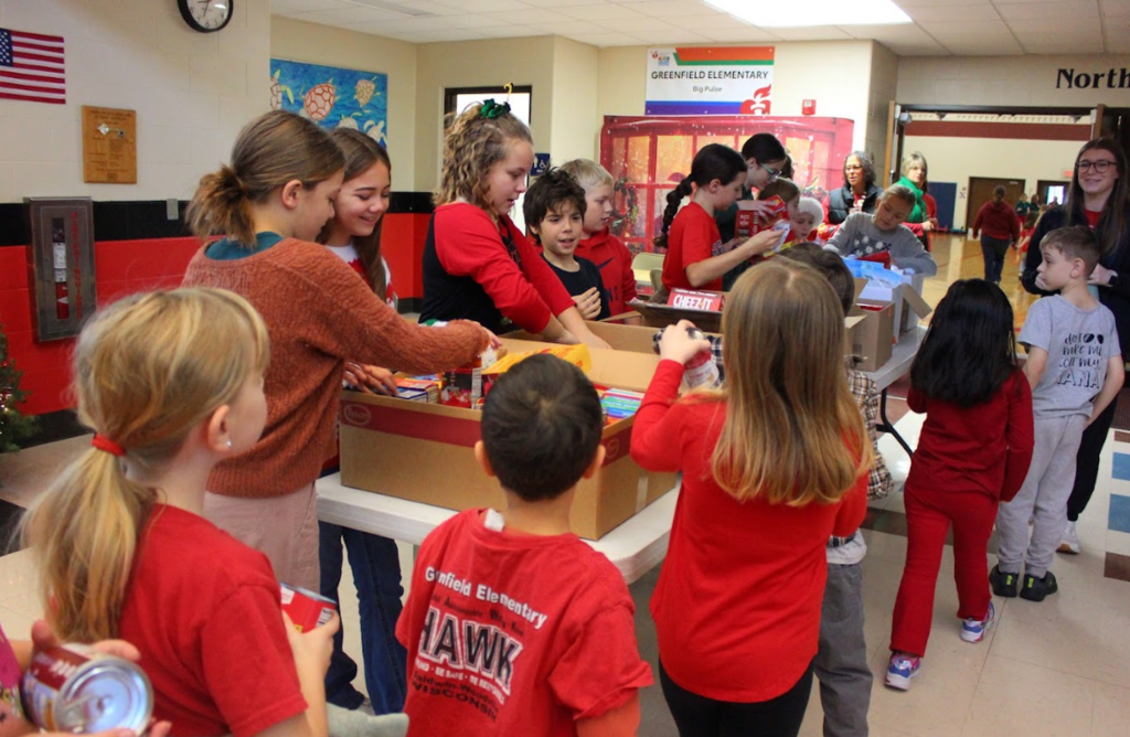 Students sorting donations.
