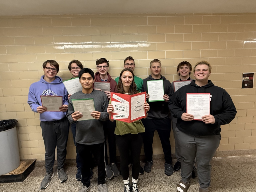 AP Calculus students smiling with their song sheets.