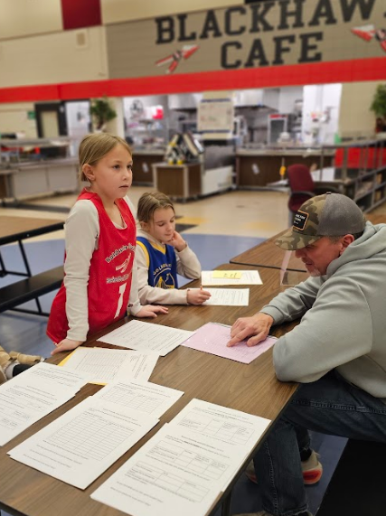 Students working with their family 