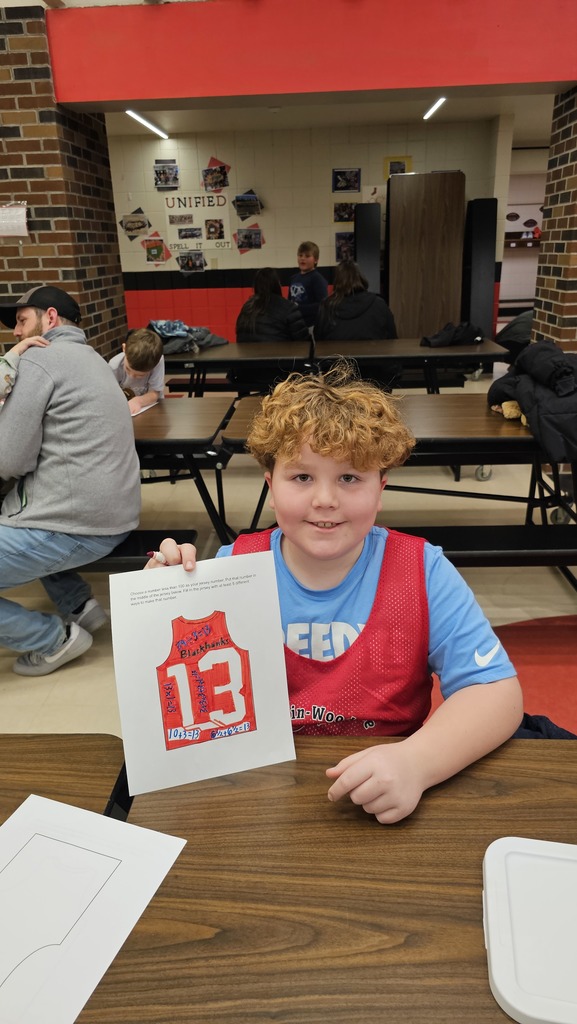 Student with a jersey he colored.