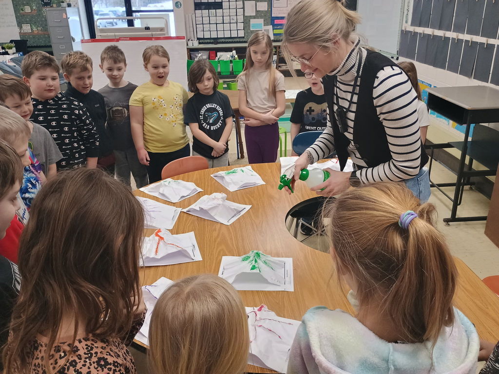 Ms. Kling demonstrating to class.