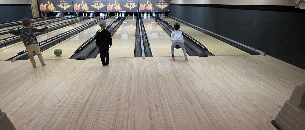 Students bowling.
