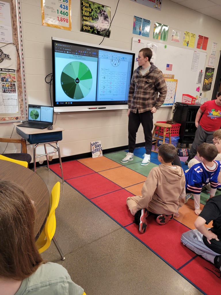Dane on the SmartBoard playing a game.