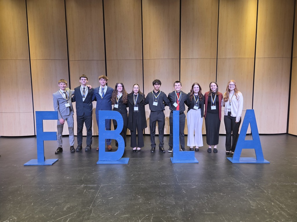 FBLA students on stage.