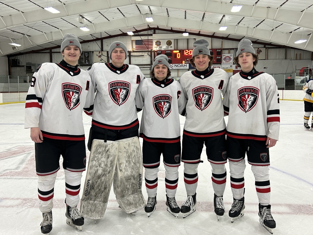 Picture of our all conference hockey players on the ice.