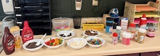 The ice cream sundae bar with all the toppings.