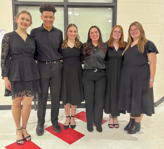 Students that were nominated smiling.