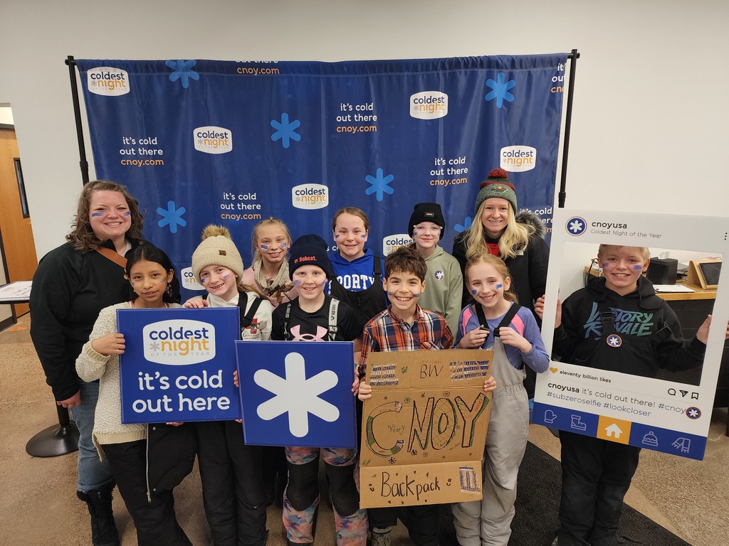 Teachers and students smiling at the event.