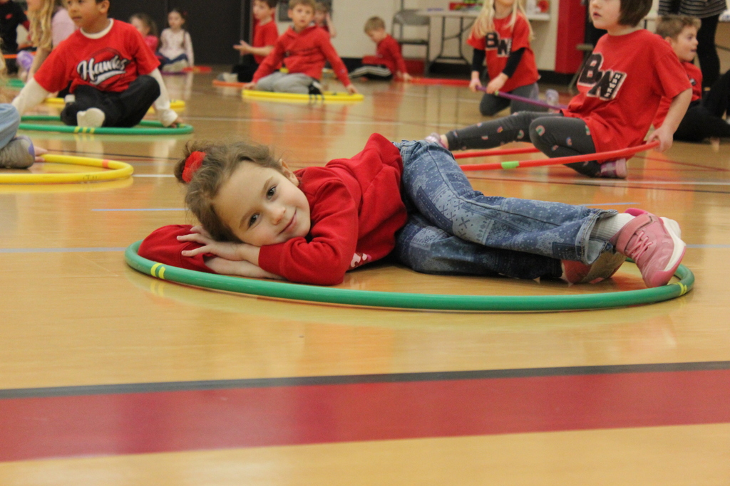 Student taking a break in the hula hoop.