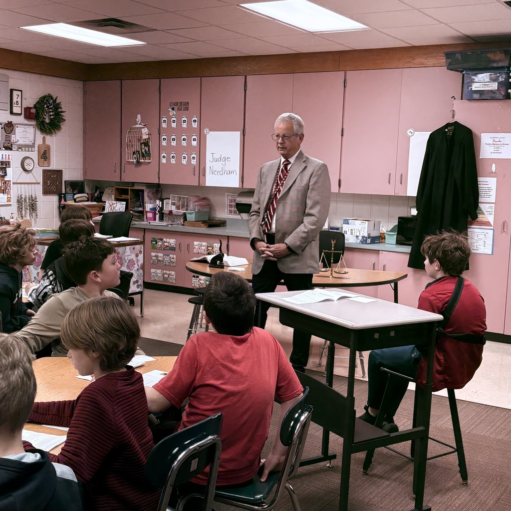 A judge presenting at career day.