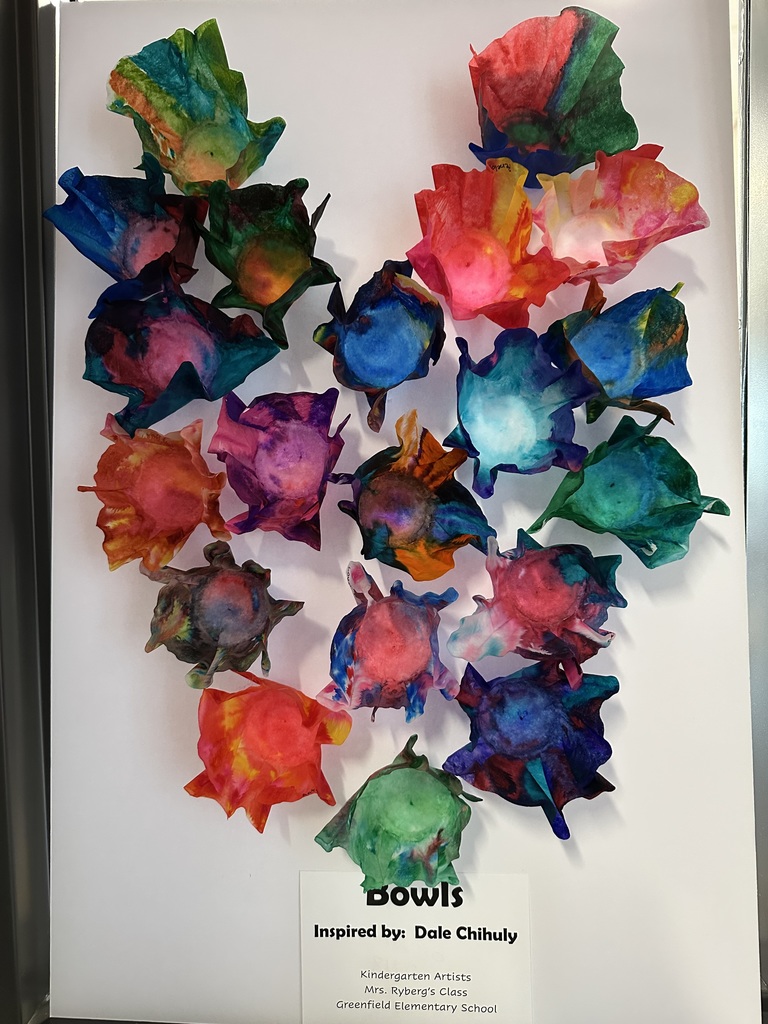 Art work displayed in the hallway. Colorful "bowls"