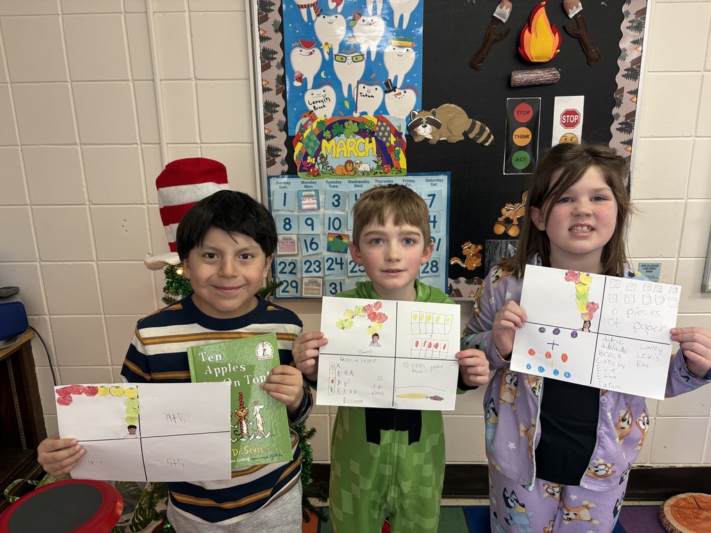 Three students with their projects.