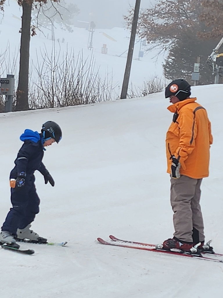 Instructor working with a student.
