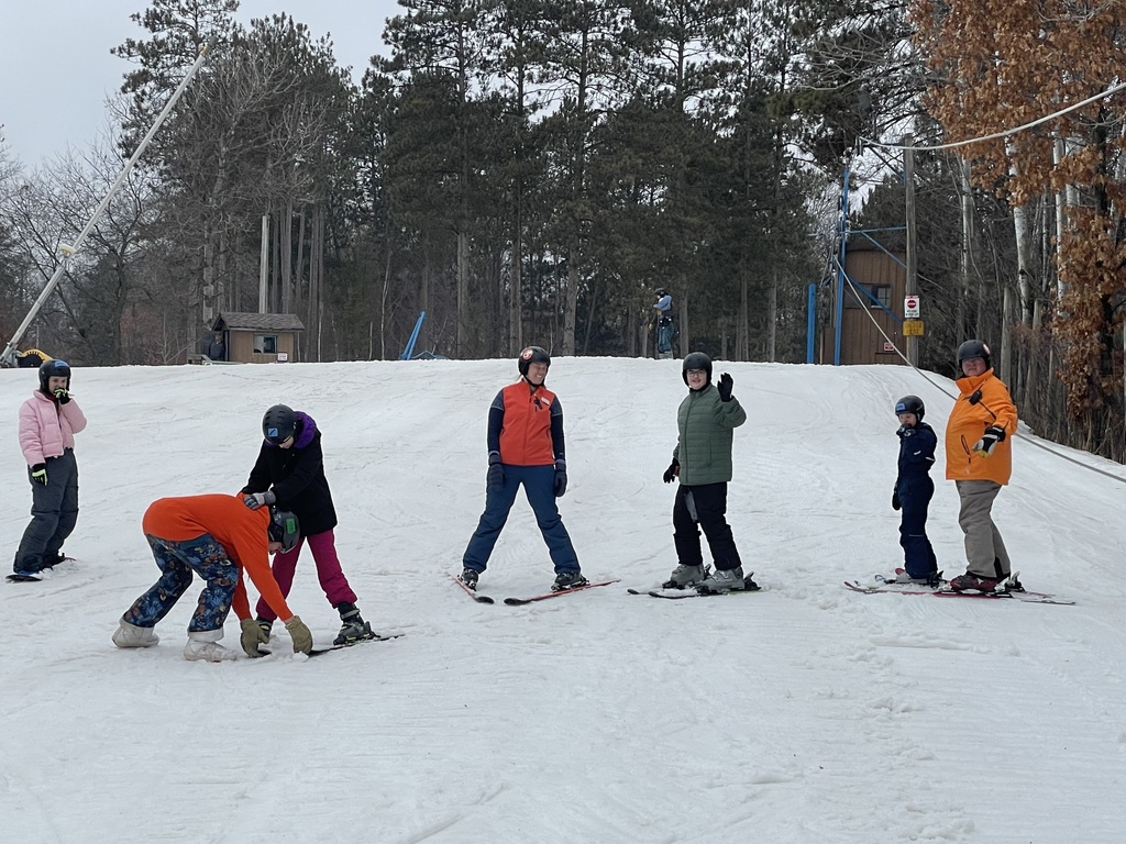 Instructors and students heading down the hill.