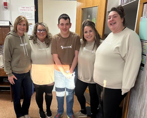 Photo of Lucas with staff.