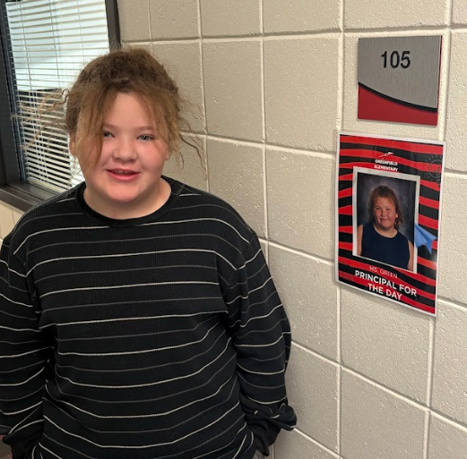 Principal Green by her office.